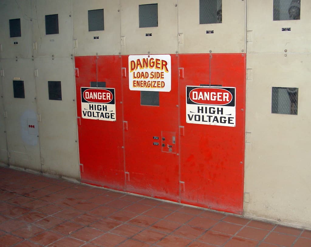 Electrical switchgear with high-voltage safety signage